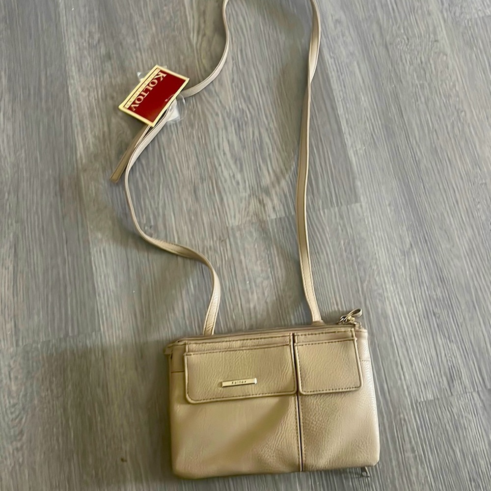 New tan koltov over the shoulder bag.